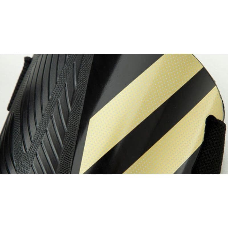 Futbalový chránič ADIDAS TIRO SG MTC BLACK GOLDMT WHITE 4