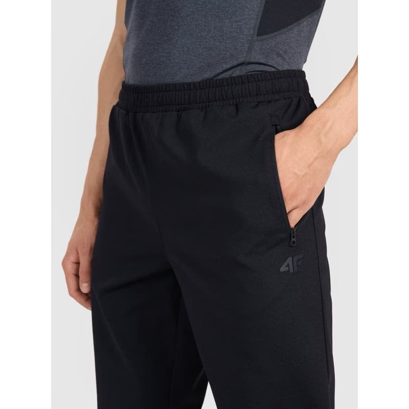 Pánske tréningové nohavice 4F TROUSERS FNK M1067-WMM00TFTRM1067-20S-DEEP BLACK 4