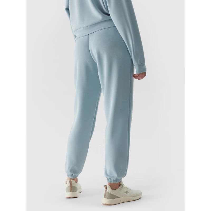 Dámske tepláky 4F TROUSERS-4FWSS24TTROF642-34S-LIGHT BLUE 4