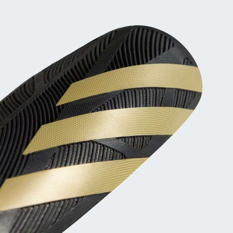 Futbalový chránič ADIDAS TIRO SG COM BLACK GOLDMT WHITE 3