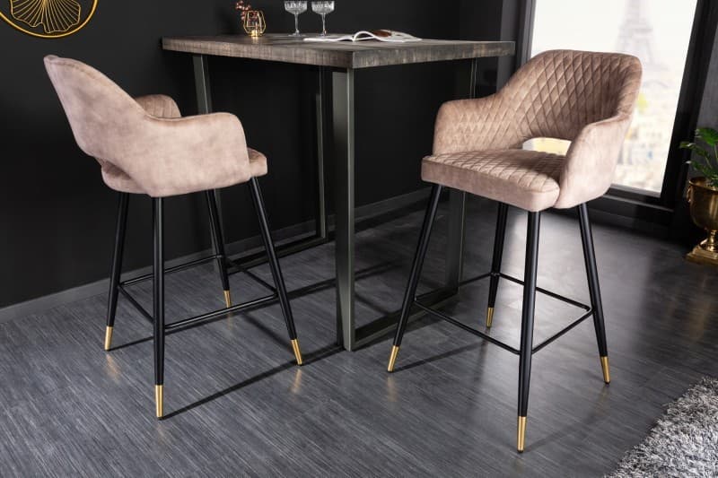 Estila Moderná art deco barová stolička Fribourg s ťavím béžovým čalúnením na čiernych nožičkách so zlatým detailom 104cm