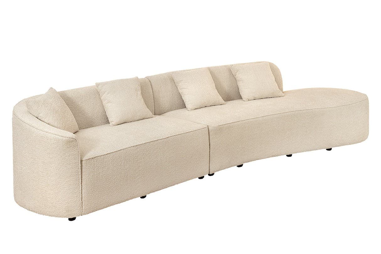 Estila Dizajnová moderná sedačka Jina oválneho tvaru s bouclé poťahom v krémovej béžovej farbe a štyrmi vankúšmi 340 cm