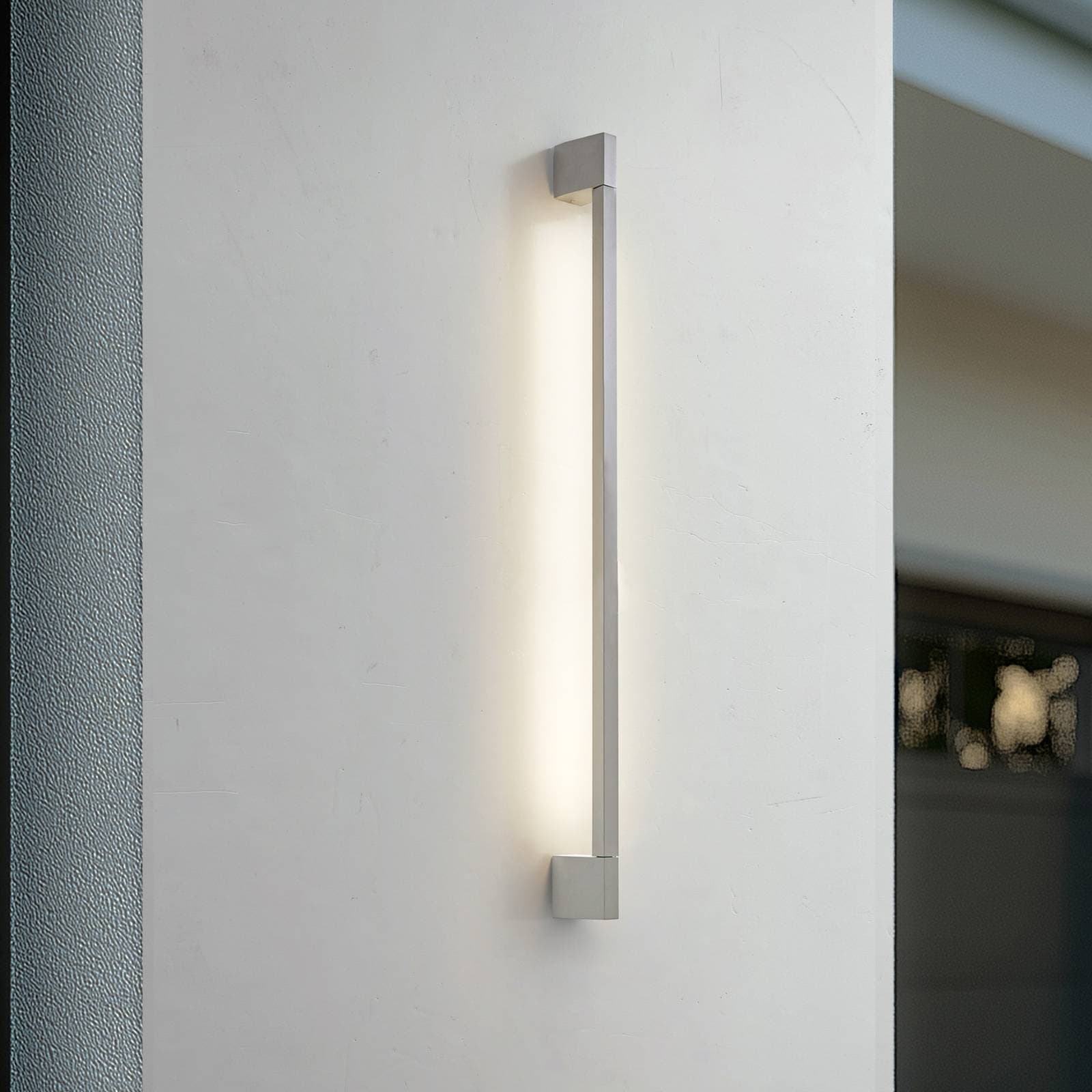 Lindby LED vonkajšie nástenné svietidlo Neano, 90 cm, kamennosivá, IP54