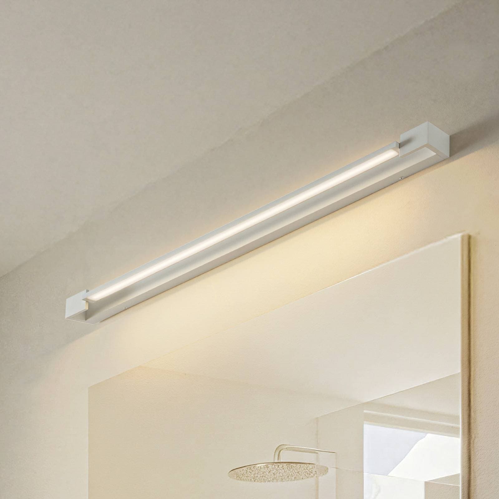 Arcchio LED nástenné svetlo Jora, 90 cm, biele, otočné, IP44