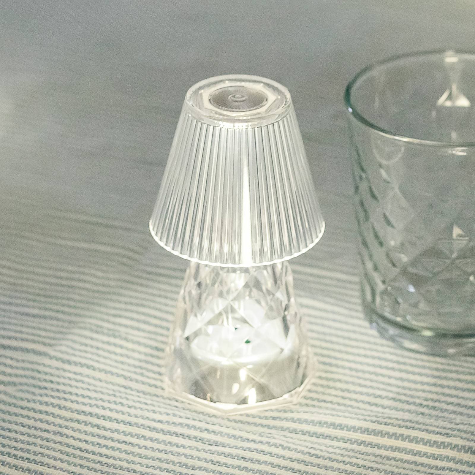 Newgarden LED stolová lampa Lola 12 lux, batéria, transparentná