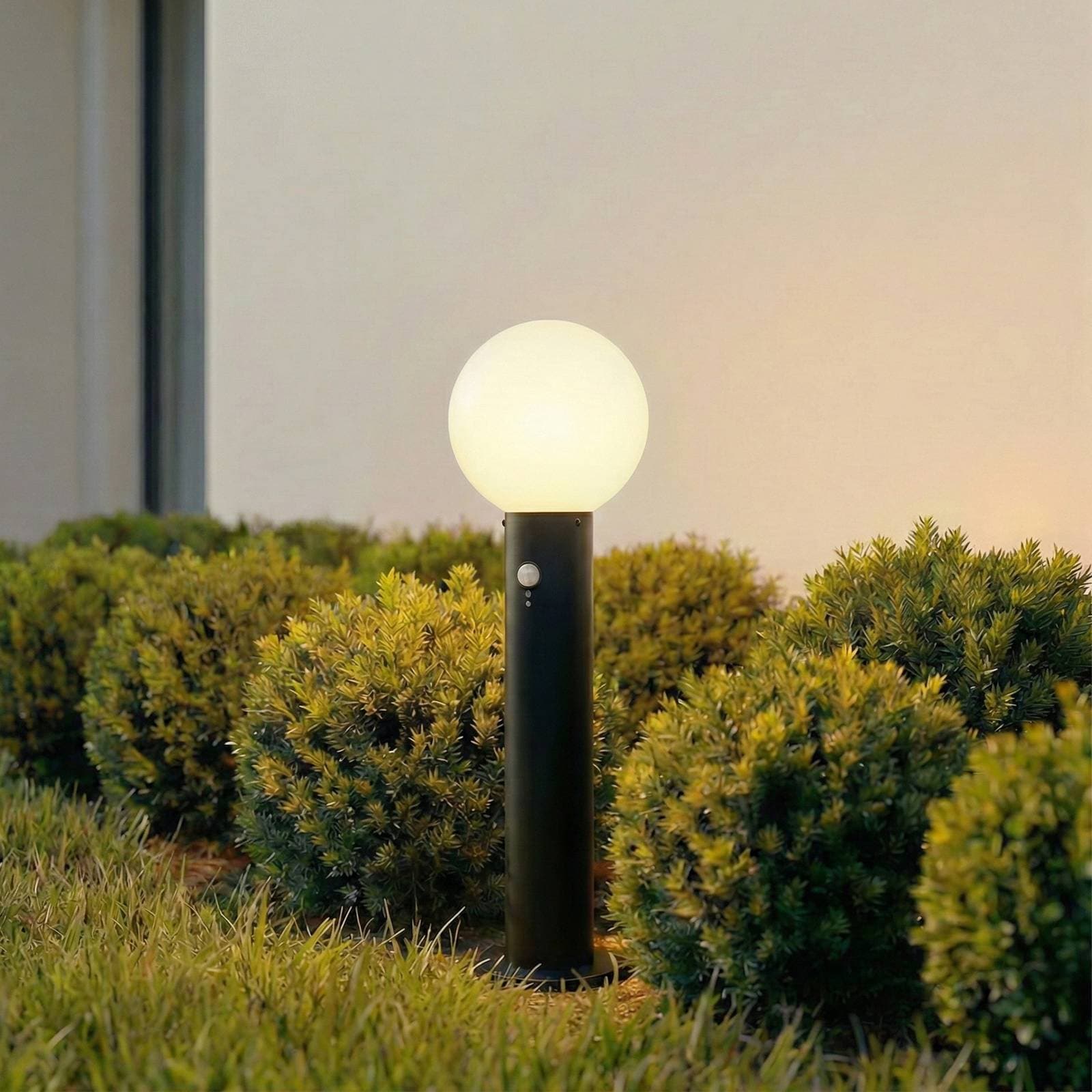 Lindby Podlahová lampa Dangan, čierna/opálová 60 cm, sklo, senzor