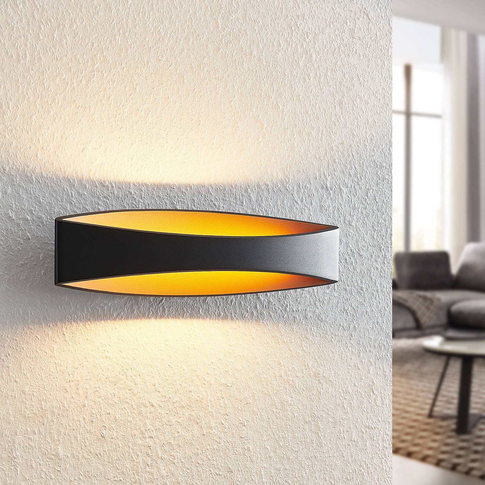 Arcchio LED nástenné svietidlo Jelle, 44 cm, čierna/zlatá, hore/dole