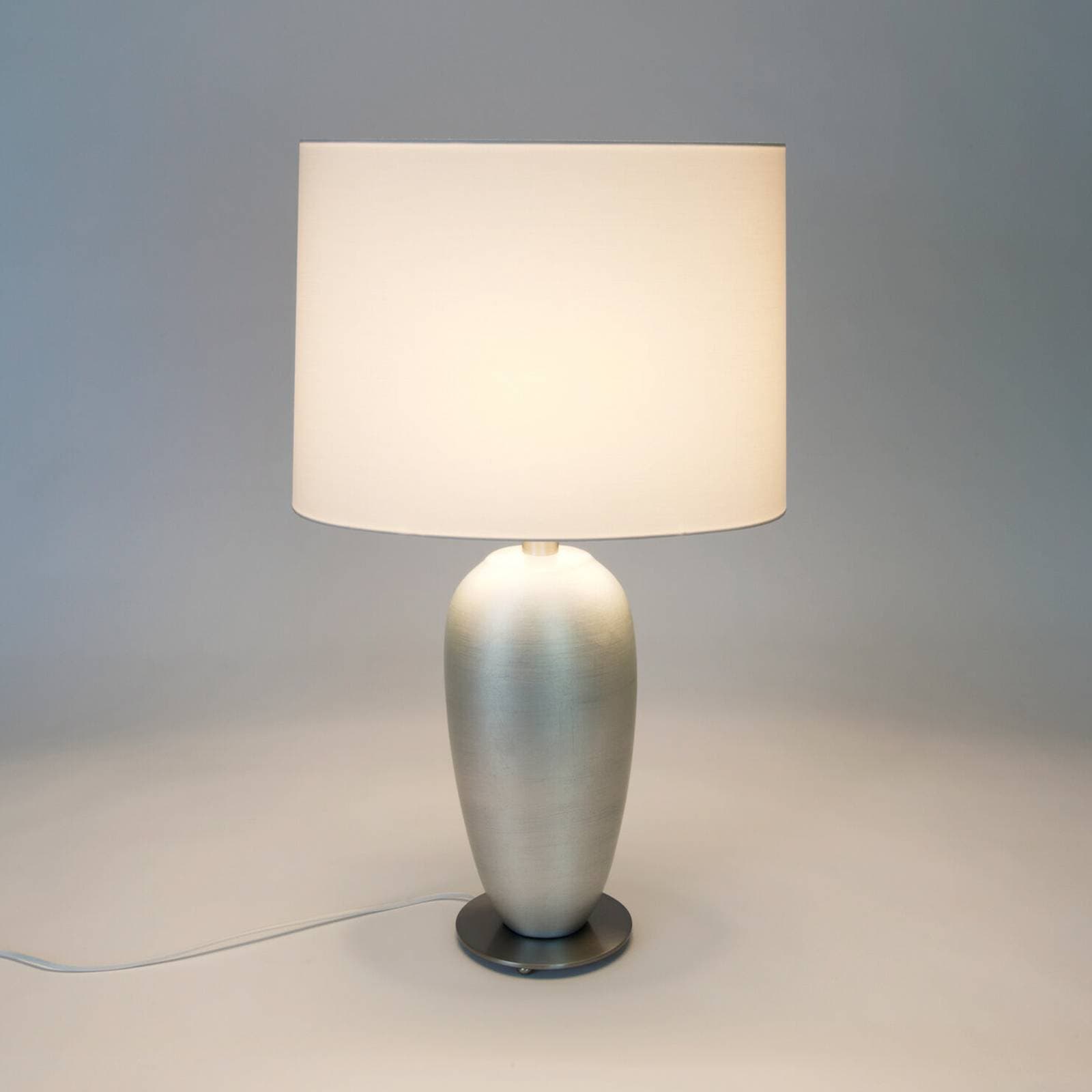 Stolová lampa OMEGA OVAL, strieborná/biela, výška 65 cm, keramika, E27