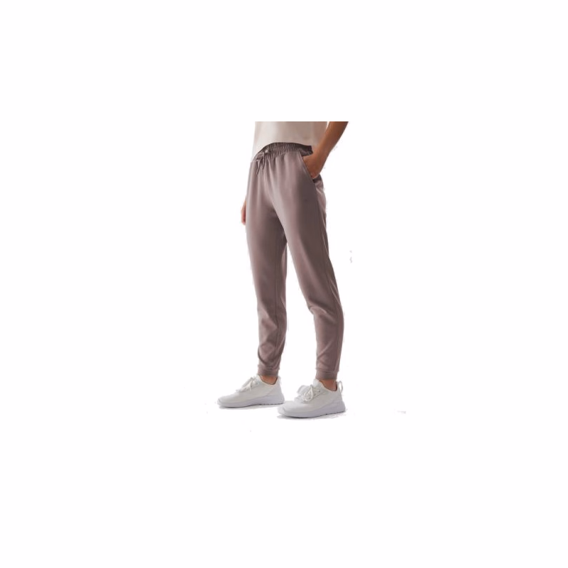 Dámske tepláky 4F TROUSERS-AW23TTROF507-83S-BEIGE